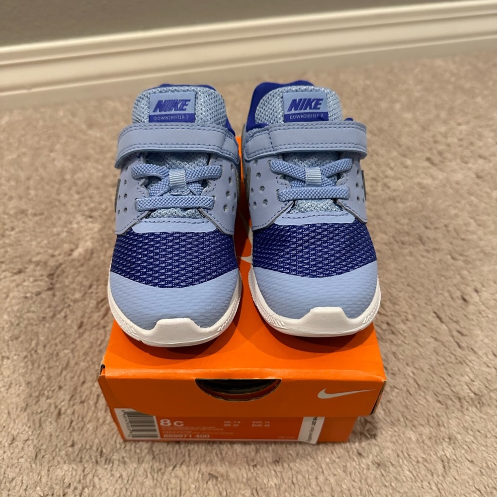 Nike downshifter 7. toddler girls size 8. Brand new in box.